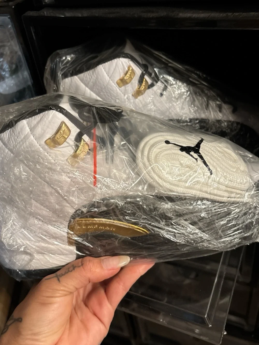 Jordan White and Gold High-Top Sneaker